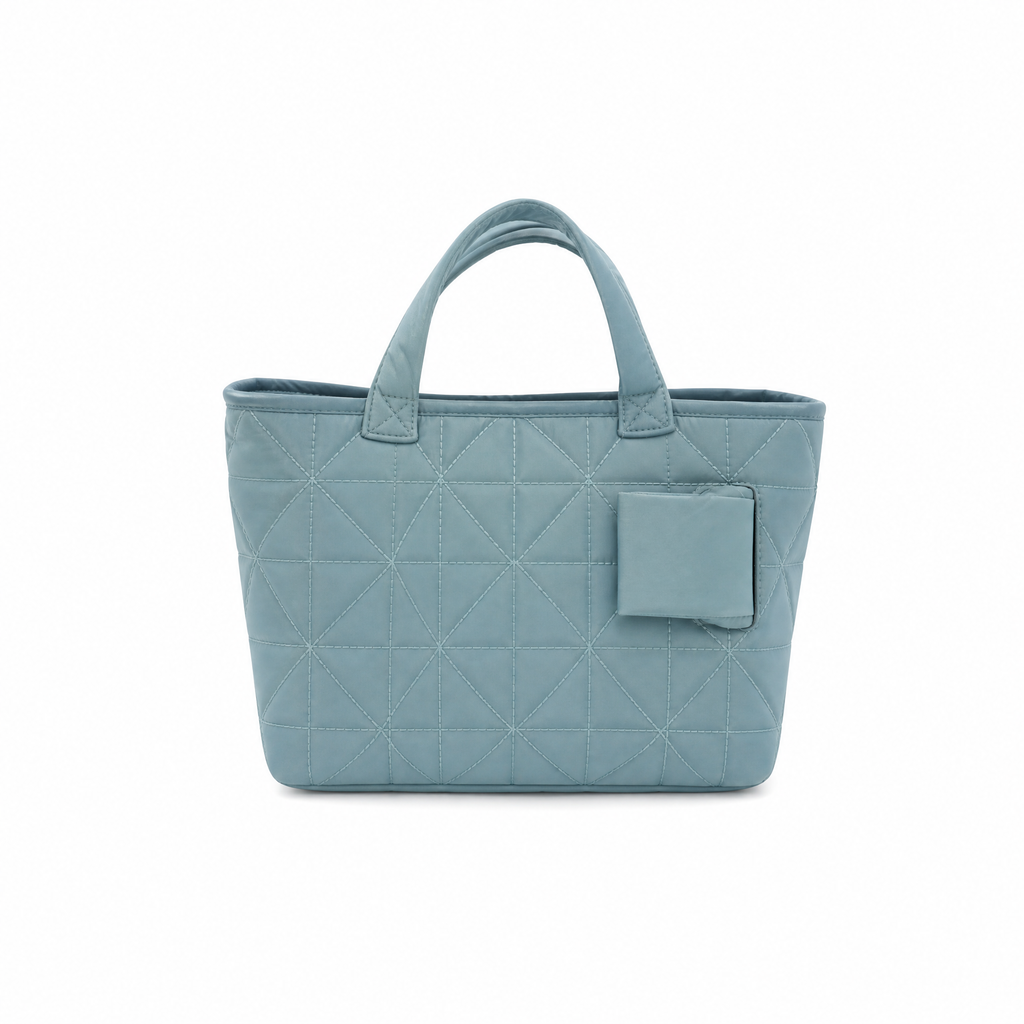 Light blue quilted handbag from the Quilted Bags and Clutches Collection.